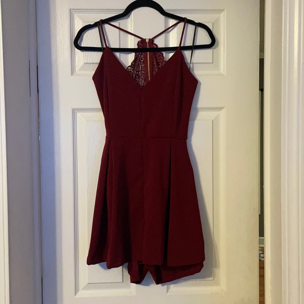 Brand New with tags Dainty Hooligan Romper. Boutique out of California!